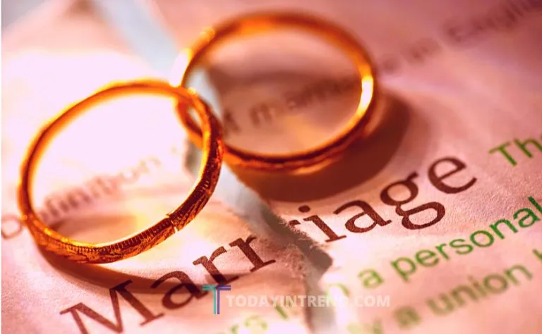 Two wedding rings on a marriage certificate