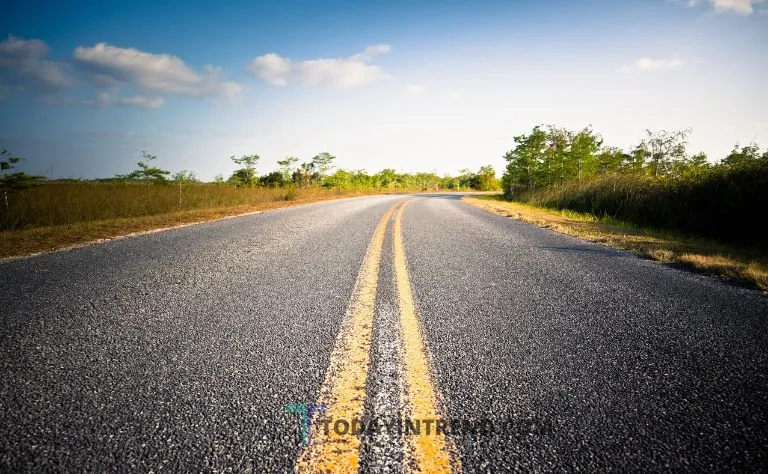 Motorcycle rider in traffic on a Michigan road