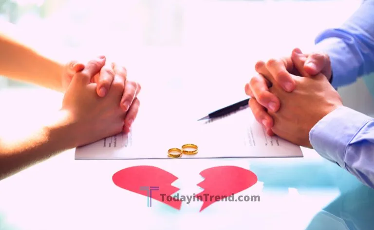 Couple sitting apart while reviewing divorce documents